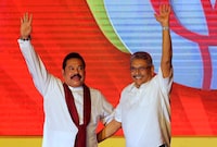 Former Sri Lankan president Mahinda Rajapaksa, left, and former Defense Secretary and his brother Gotabaya Rajapaksa wave to supporters during a party convention held to announce the presidential candidacy in Colombo, Sri Lanka on August 11, 2019. Tamil diaspora groups are praising Ottawa's sanctions on Sri Lanka officials, including the brothers, while asking Canada to bring that country to international tribunals. THE CANADIAN PRESS/AP, Eranga Jayawardena