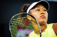 Naomi Osaka of Japan reacts during her women's singles match against Karolina Pliskova of the Czech Republic at the Brisbane International tennis tournament in Brisbane on January 3, 2024. (Photo by Patrick HAMILTON / AFP) / --IMAGE RESTRICTED TO EDITORIAL USE - STRICTLY NO COMMERCIAL USE-- (Photo by PATRICK HAMILTON/AFP via Getty Images)