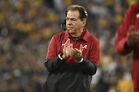 Alabama head coach Nick Saban reacts after running back Jase McClellan (2) scored a touchdown during the second half of the Rose Bowl CFP NCAA semifinal college football game against Michigan Monday, Jan. 1, 2024, in Pasadena, Calif. (AP Photo/Kyusung Gong)