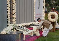 Governor of Maharashtra Bhagat Singh Koshyari pays tribute to victims of 2008 Mumbai terror attacks on its anniversary at the police headquarters in Mumbai, India, Saturday, Nov. 26, 2022. (AP Photo/Rajanish Kakade)