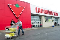 Canadian Tire says it's acquiring 10 former Bed Bath & Beyond leases to expand its Mark's and Pro Hockey Life banners. People leave after shopping at Canadian Tire in Toronto on Thursday, May 12, 2011. THE CANADIAN PRESS/Nathan Denette