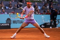 Rafael Nadal of Spain competes against Darwin Blanch of United States during the Mutua Madrid Open tennis tournament in Madrid, Thursday, April 25, 2024. (AP Photo/Manu Fernandez)