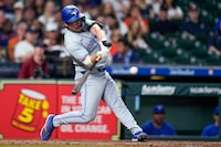Toronto Blue Jays' Davis Schneider hits a two-run home run against the Houston Astros during the ninth inning of a baseball game Tuesday, April 2, 2024, in Houston. (AP Photo/Eric Christian Smith)