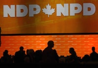 NDP delegates gather on the party convention floor in Ottawa, Friday, February 16, 2018. The Federal Court of Appeal says the court can't intervene in a case where more than five dozen NDP MPs were ordered to repay $2.7 million in expenses the House of Commons says was actually for partisan purposes. THE CANADIAN PRESS/Fred Chartrand