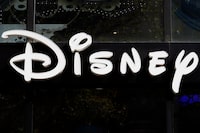 FILE - This Sept. 20, 2017, file photo shows a sign at the Disney store on the Champs Elysees Avenue in Paris, France. Disney reports earnings on Wednesday, Feb. 7, 2024. (AP Photo/Francois Mori, File)