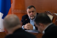 FILE - Ruben Vardanyan, the State Minister of Nagorno-Karabakh, also known as Artsakh leads a cabinet meeting in Stepanakert, the capital of the region of Nagorno-Karabakh, also known as Artsakh, on Tuesday, Jan. 3, 2023. Azerbaijan says Wednesday, Sept. 27 it has detained Vardanyan, the former head of Nagorno-Karabakh's separatist government, as he tried to cross into Armenia following Azerbaijan's 24-hour blitz last week to reclaim control of the enclave. (Edgar Harutyunyan/PAN Photo via AP, File)