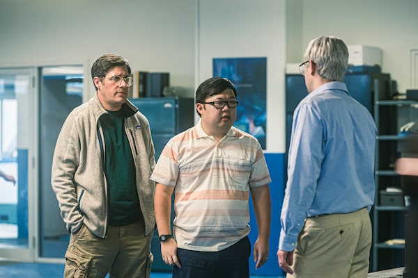 Rich Sommer as “Paul” and SungWon Cho
as “Ritchie” in Matt Johnson’s
BlackBerry. Courtesy of IFC Films / Elevation Pictures