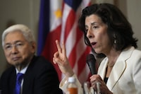 U.S. Commerce Secretary Gina Raimondo, right, gestures beside Philippine Trade and Industry Secretary Alfredo Pascual during a press conference at Paranaque city, Philippines on Monday, March 11, 2024. The visit aims to boost U.S. contributions to the Philippines and to further strengthen bilateral economic ties. (AP Photo/Aaron Favila)