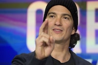 FILE - Adam Neumann, co-founder and CEO of WeWork, attends the opening bell ceremony at Nasdaq, Jan. 16, 2018, in New York. Neumann, the ousted co-founder of WeWork, is now exploring an deal to buy back the office sharing company after expressing dismay over its bankruptcy process. In a Monday, Feb. 5, 2024 letter obtained by The Associated Press, an attorney representing Neumann and Flow Global Holdings said that WeWork’s former CEO had partnered up with capital sources like Dan Loeb’s Third Point and are ready to submit a purchase proposal. (AP Photo/Mark Lennihan, file)