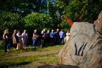 Ontario says it will support an opposition bill to declare intimate partner violence an epidemic in the province. People take part in a vigil at the Women's Monument in Petawawa, Ont., following the jury's release of recommendations in the Borutski Inquest in Pembroke, Ont., on Tuesday, June 28, 2022.