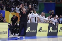 Germany coach Gordie Herbert directs his team during the championship game of the Basketball World Cup against Serbia in Manila, Philippines, Sunday, Sept. 10, 2023. (AP Photo/Michael Conroy)