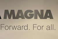 A Magna logo is shown in Milton, Ont. on Saturday, March 24, 2023. Magna International Inc. says it may buy back up to 300,000 of its common shares under its normal course issuer bid over the coming year. THE CANADIAN PRESS/Staff