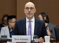 Parliamentary Budget Officer Yves Giroux waits to appear before the Senate Committee on National Finance, Tuesday, October 17, 2023 in Ottawa. THE CANADIAN PRESS/Adrian Wyld