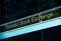 A Toronto Stock Exchange ticker is seen at The Exchange Tower in Toronto on Thursday, August 18 2011.  E CANADIAN PRESS/Aaron Vincent Elkaim