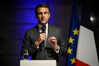 France's President Emmanuel Macron delivers a speech during a ceremony before France's handball team players at the presidential Elysee Palace in Paris, December 18, 2023, one day after they won the gold medal after the final between France and Norway of the IHF World Women's Handball Championship in Herning, Denmark.   Julien de Rosa/Pool via REUTERS