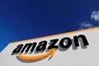 FILE PHOTO: The logo of Amazon is seen at the company's logistics centre in Boves, France, October 6, 2021 REUTERS/Pascal Rossignol/File Photo