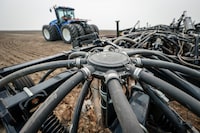 A seeding rig is readied to plant a canola crop on a farm near Cremona, Alta., Tuesday, May 16, 2023. Statistics Canada says manufacturing sales rose 1.2 per cent to $72.9 billion in May after declining 0.1 per cent in April. THE CANADIAN PRESS/Jeff McIntosh
