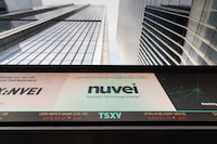 A sign displaying a Nuvei logo is seen at the Toronto Stock Exchange in November of 2020.