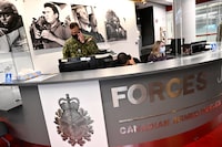 Staff work at a Canadian Armed Forces recruitment centre in Ottawa, on Tuesday, Sept. 20, 2022.&nbsp;The Canadian Armed Forces says it has received more than 2,400 applications from permanent residents interested in joining the military since the beginning of November. THE CANADIAN PRESS/Justin Tang