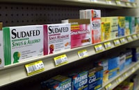 FILE - Sudafed and other common nasal decongestants containing pseudoephedrine are on display behind the counter at Hospital Discount Pharmacy in Edmond, Okla., Jan. 11, 2005. The leading decongestant used by millions of Americans looking for relief from a stuffy nose is likely no better than a dummy pill, according to government experts who reviewed the latest research on the long-questioned drug ingredient. Advisers to the Food and Drug Administration voted unanimously on Tuesday, Sept. 12, 2023 against the effectiveness of the ingredient found in popular versions of Sudafed, Allegra, Dayquil and other medications sold on pharmacy shelves. (AP Photo, File)