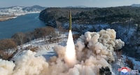 Ballistic missile, said to be solid-fuel and hypersonic, launches during a test at an unspecified location in North Korea in this picture released by the Korean Central News Agency on January 14, 2024.  KCNA via REUTERS