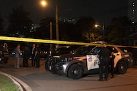 Toronto Police work the scene of a shooting in Toronto on Tuesday, July 25, 2023. A Toronto police dog was killed Tuesday evening while police were looking for an armed suspect.THE CANADIAN PRESS/Arlyn McAdorey