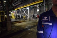 A Cameco employee is shown during a Cameco media tour of the uranium mine in Cigar Lake, Wednesday, September 23, 2015. THE CANADIAN PRESS/Liam Richards