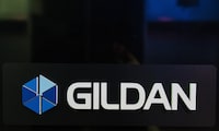 The Gildan logo is seen outside their offices in Montreal, Monday, Dec. 11, 2023. An activist investor seeking to reinstate Glenn Chamandy as chief executive of Gildan Activewear Inc. says it wants to reduce costs at the clothing manufacturer and increase its market share in a bid to boost its earnings and share price. THE CANADIAN PRESS/Christinne Muschi