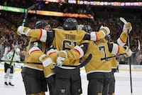 LAS VEGAS, NEVADA - MAY 03: Mark Stone #61 of the Vegas Golden Knights celebrates with teammates after scoring a goal during the third period against the Dallas Stars in Game Six of the Western Conference First Round Playoffs at T-Mobile Arena on May 03, 2024 in Las Vegas, Nevada. (Photo by Ethan Miller/Getty Images)