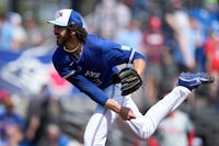 Toronto Blue Jays relief pitcher Jordan Romano (68) throws during the fourt inning of a spring training baseball game against the Philadelphia Phillies Monday, March 4, 2024, in Dunedin, Fla. (AP Photo/Charlie Neibergall)