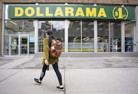 Dollarama Inc. reported its third-quarter profit and sales rose compared with a year ago. A person walks past a Dollarama store in Montreal, Wednesday, June 7, 2023. THE CANADIAN PRESS/Christinne Muschi