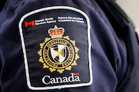 The Canada Border Services Agency says it has confiscated more than 6,300 kilograms of methamphetamine in British Columbia over the last six months, including the largest ever single seizure of the drug. A CBSA patch is seen on an officer in Calgary, Alta., Thursday, Aug. 1, 2019. THE CANADIAN PRESS/Jeff McIntosh
