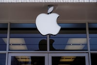 FILE PHOTO: Logo of an Apple store is seen as Apple Inc. reports fourth quarter earnings in Washington, U.S., January 27, 2022.      REUTERS/Joshua Roberts/File Photo