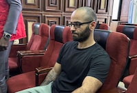 Tigran Gambaryan, an executive of Binance, the world's largest cryptocurrency exchange, sits as he waits to face prosecution for tax evasion and money laundering at the federal high court in Abuja, Nigeria April 4, 2024. REUTERS/ Abraham Achirga