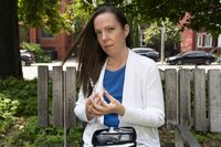 Candice Chaffey holds a syringe from a naloxone kit as she poses for a photo in Toronto, on Thursday, June 29, 2023. THE CANADIAN PRESS/Arlyn McAdorey