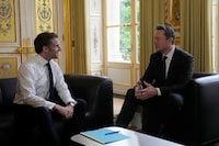 SpaceX, Twitter and electric car maker Tesla CEO Elon Musk meets with France's President Emmanuel Macron (L) at the Elysee presidential palace in Paris on May 15, 2023. (Photo by Michel Euler / POOL / AFP) (Photo by MICHEL EULER/POOL/AFP via Getty Images)