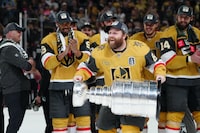 Jun 13, 2023; Las Vegas, Nevada, USA; Vegas Golden Knights forward Phil Kessel (8) hoists the Stanley Cup after defeating the Florida Panthers in game five of the 2023 Stanley Cup Final at T-Mobile Arena. Mandatory Credit: Stephen R. Sylvanie-USA TODAY Sports