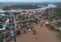 Houses are seen in a flooded area after an extratropical cyclone hit southern cities, in Lajeado, Rio Grande do Sul state, Brazil September 6, 2023. REUTERS/Diego Vara