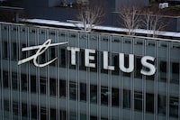 The Telus Corporation logo is seen on the outside of the company's headquarters in downtown Vancouver, on Thursday, January 19, 2023. THE CANADIAN PRESS/Darryl Dyck