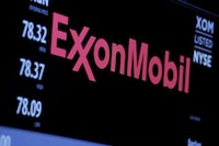 FILE PHOTO: The logo of Exxon Mobil Corporation is shown on a monitor above the floor of the New York Stock Exchange in New York, December 30, 2015.  REUTERS/Lucas Jackson/File Photo/File Photo