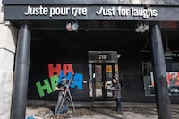A news crew shoots a report in front of the Just for Laughs theatre is seen Tuesday, March 5, 2024  in Montreal. The company that runs the annual comedy festival has filed for bankruptcy protection.THE CANADIAN PRESS/Ryan Remiorz