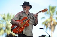 FILE - Duane Eddy performs on the third day of the 2014 Stagecoach Music Festival at the Empire Polo Field, April 27, 2014, in Indio, Calif. Eddy, a pioneering guitar hero whose reverberating electric sound on instrumentals such as "Rebel Rouser" and “Peter Gunn” helped put the twang in early rock 'n' roll and influenced George Harrison, Bruce Springsteen and countless other musicians, died of cancer Tuesday, April 30, 2024. He was 86. (Photo by Chris Pizzello/Invision/AP, File)