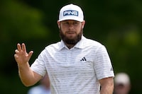Tyrrell Hatton, of England, waves after his birdie putt on the ninth hole during second round of the Wells Fargo Championship golf tournament at the Quail Hollow Club on Friday, May 5, 2023, in Charlotte, N.C. (AP Photo/Chris Carlson)