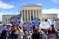 Demonstrators rally in support of abortion rights at the US Supreme Court in Washington, DC, April 15, 2023. - The Court on April 14 temporarily preserved access to mifepristone, a widely used abortion pill, in an 11th-hour ruling preventing lower court restrictions on the drug from coming into force. (Photo by Andrew Caballero-Reynolds / AFP) (Photo by ANDREW CABALLERO-REYNOLDS/AFP via Getty Images)