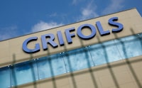 FILE PHOTO: The logo of the Spanish pharmaceuticals company Grifols is pictured on theirs facilities in Parets del Valles, north of Barcelona, Spain, January 9, 2024. REUTERS/Albert Gea/File Photo