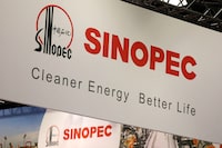 FILE PHOTO: The logo of China Petroleum & Chemical Corporation, or Sinopec, is displayed during the LNG 2023 energy trade show in Vancouver, British Columbia, Canada, July 12, 2023. REUTERS/Chris Helgren/File Photo