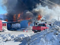 The building that houses Nunatsiaq News in Iqaluit was destroyed by fire Tuesday as shown in this handout photo provided by the newspaper. The outlet's managing editor says nobody was injured and the weekly paper will still go out as planned. THE CANADIAN PRESS/HO-Nunatsiaq News-Dave Lochead
**MANDATORY CREDIT**