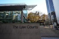<p>The Law Courts building, which is home to B.C. Supreme Court and the Court of Appeal, is seen in Vancouver, on Thursday, November 23, 2023. A defence lawyer for Ibrahim Ali, who was convicted of the first-degree murder of a 13-year-old girl in Burnaby, B.C., says his client wants to appear at his sentencing hearing by video over fear for his safety. THE CANADIAN PRESS/Darryl Dyck</p>