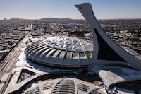 An aerial view of Olympic Stadium in Montreal, Monday Feb. 5, 2024. The Quebec government has awarded the organization that manages Montreal's Olympic Stadium up to $40 million to pay for repairs and decontamination following a March 21 fire. THE CANADIAN PRESS/Christinne Muschi
