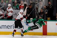 Ottawa Senators left wing Brady Tkachuk (7) shoves Dallas Stars defenseman Jani Hakanpaa (2) during the third period of an NHL hockey game in Dallas, Friday, Dec. 15, 2023. (AP Photo/Michael Ainsworth)